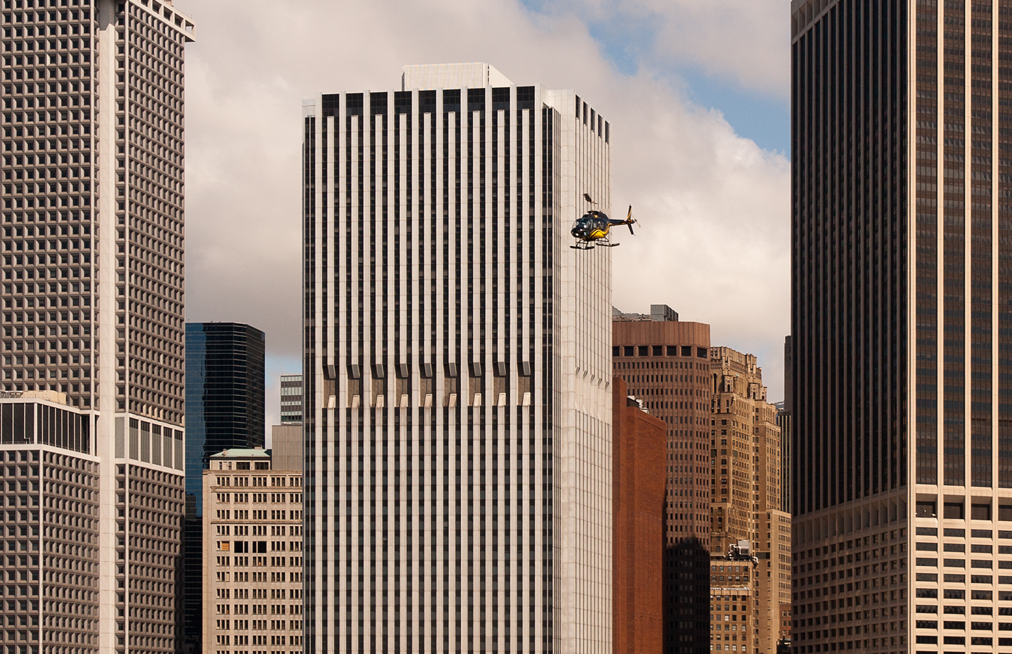 Skyscrapers with helicopter in Manhattan