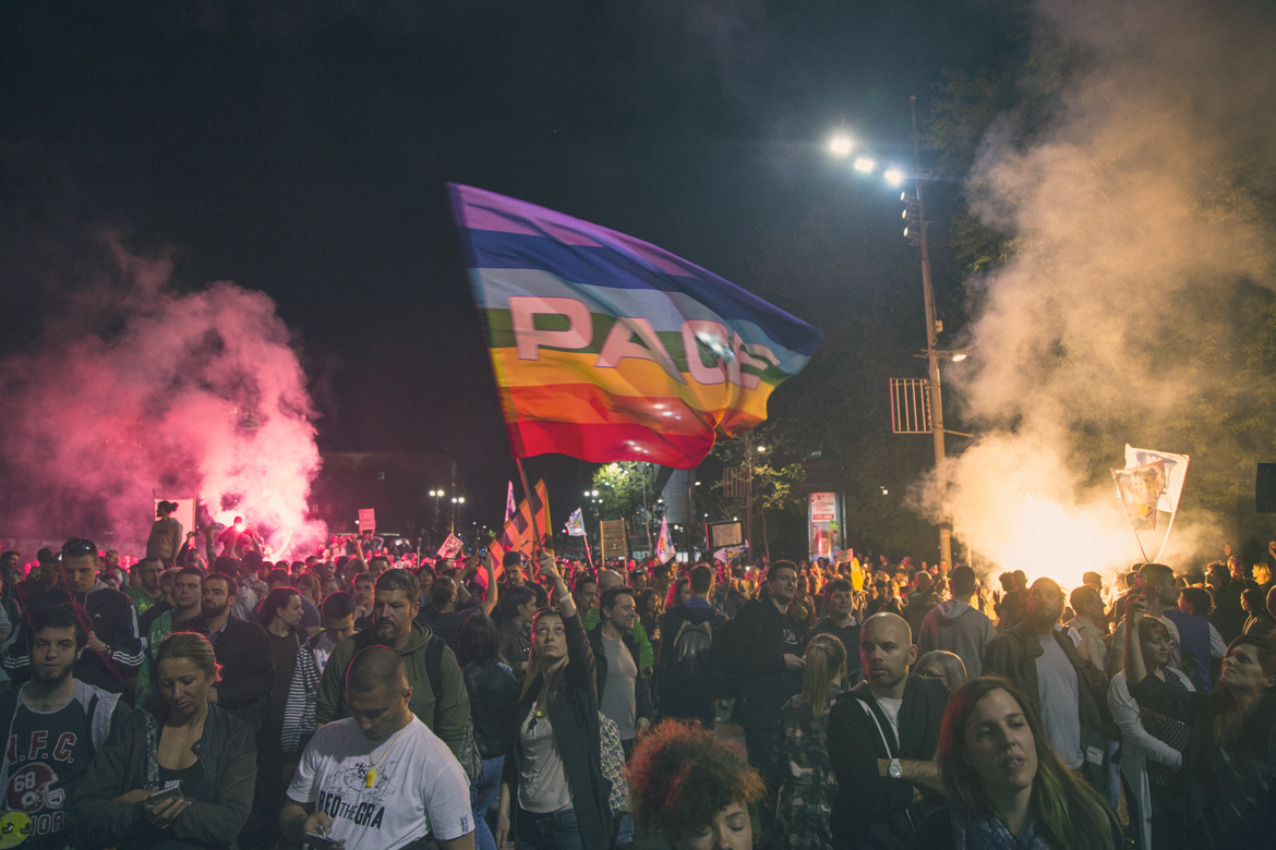 Protesters with Pace flag