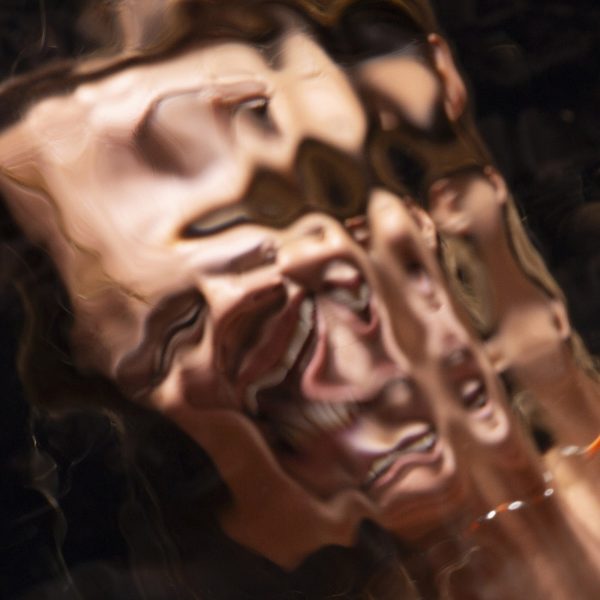 abstract female figure distorted by water ripples - details